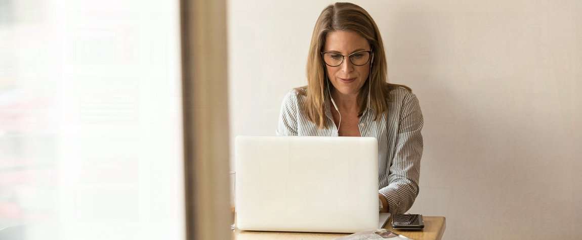 A woman working on laptop