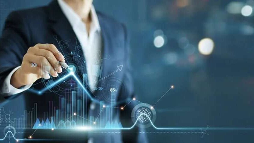 A man using a futuristic holographic interface