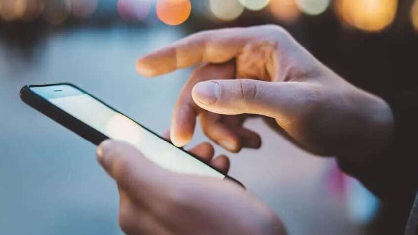 A person using a smart phone